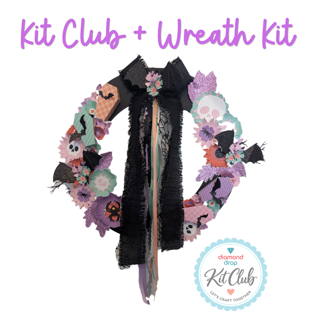 A Halloween-themed Kit Club + Wreath Kit product presentation on a white background, featuring a black tattered cape and a decorated wreath with purple, pink, orange, and green elements, along with a Kit Club logo badge.