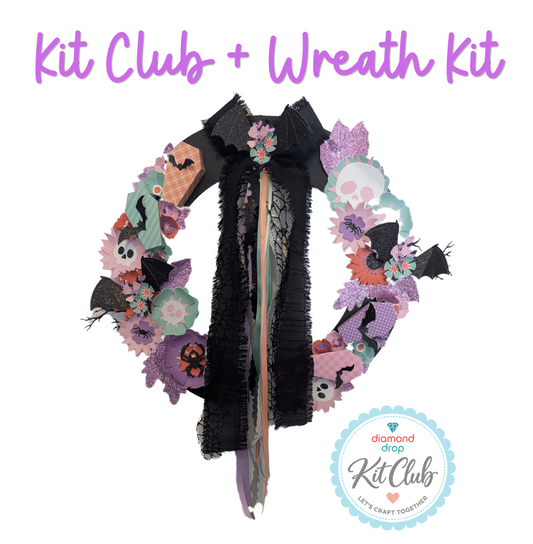 A Halloween-themed Kit Club + Wreath Kit product presentation on a white background, featuring a black tattered cape and a decorated wreath with purple, pink, orange, and green elements, along with a Kit Club logo badge.